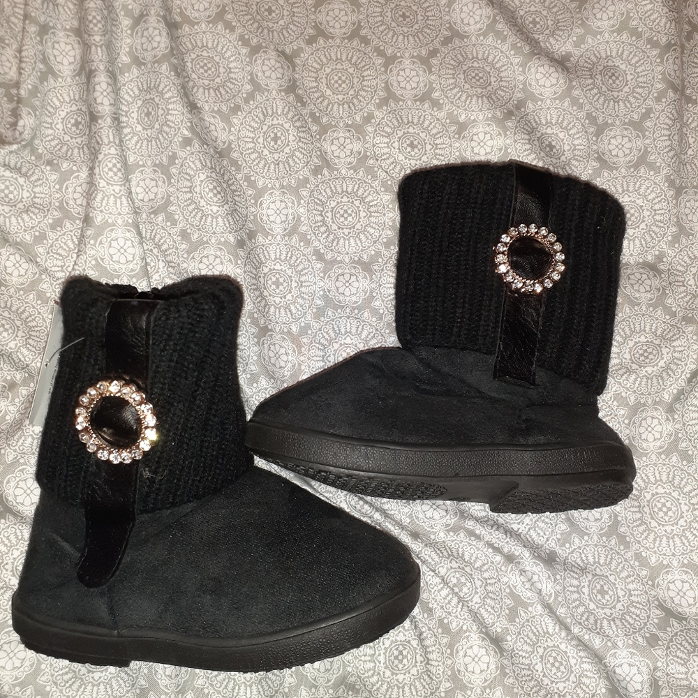 Black boots with rhinestone charm